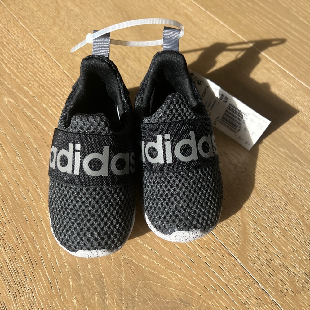 Brand new adidas slip ons